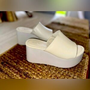 SOLD!!  Never been worn, cute wedge with platform heel